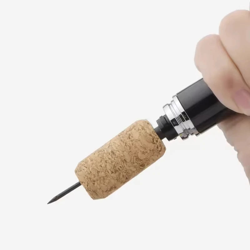 Le Tire-bouchon à air avec un bouchon